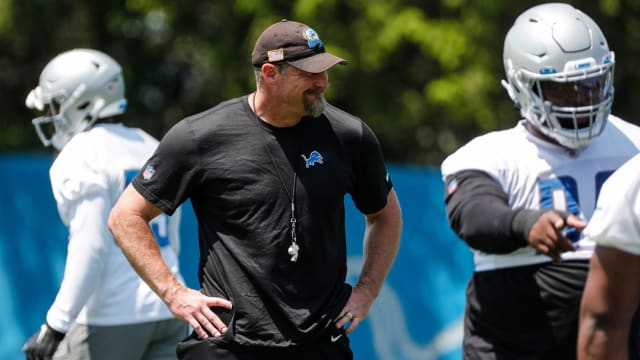 Detroit Lions head coach Dan Campbell observes OTA practice